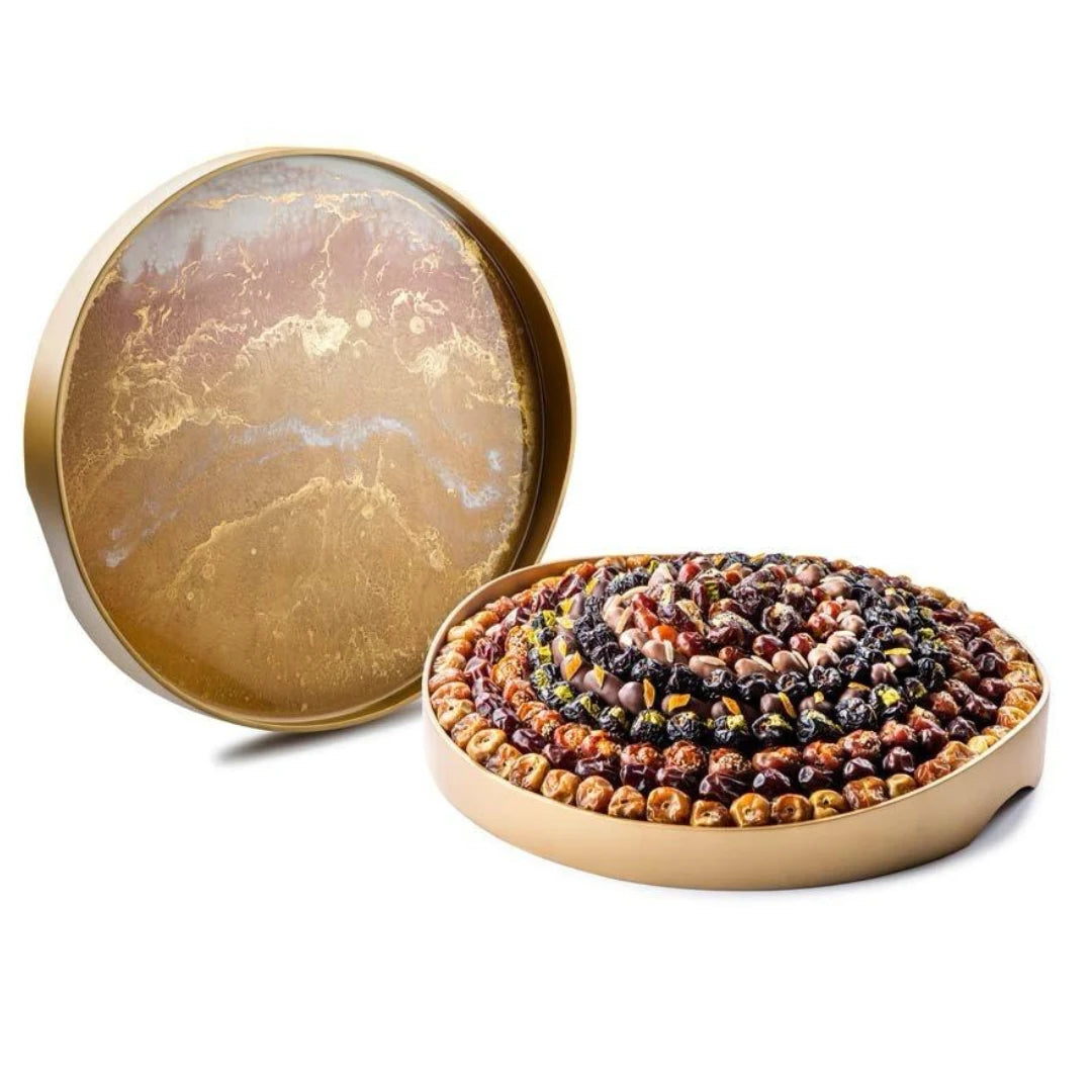 Gold presentation tin filled with a selection of dates