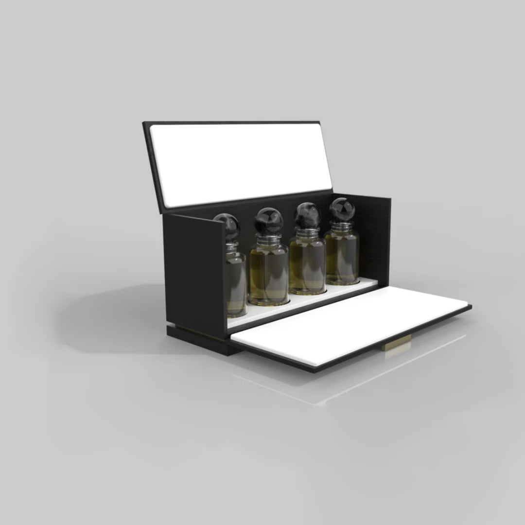 Black presentation case containing four fragrance vials